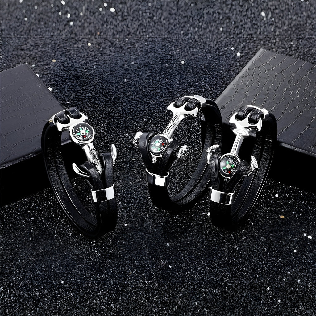 Bracelet homme cuir noir double cordon avec ancre marine et boussole argentée style marin.