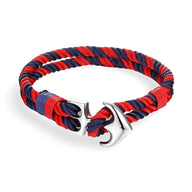 Bracelet homme double cordons bleu et rouge avec ancre marine argentée en acier.