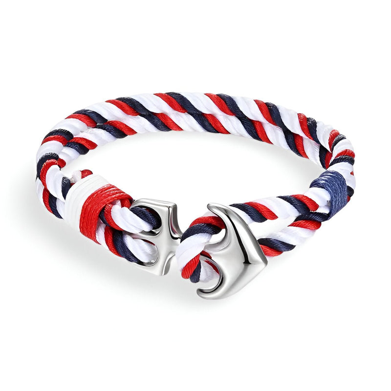 Bracelet marin double cordons bleu, blanc, rouge avec ancre en métal argenté.