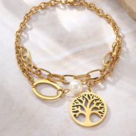 Bracelet double en acier inoxydable doré avec pendentif arbre de vie et perle blanche.