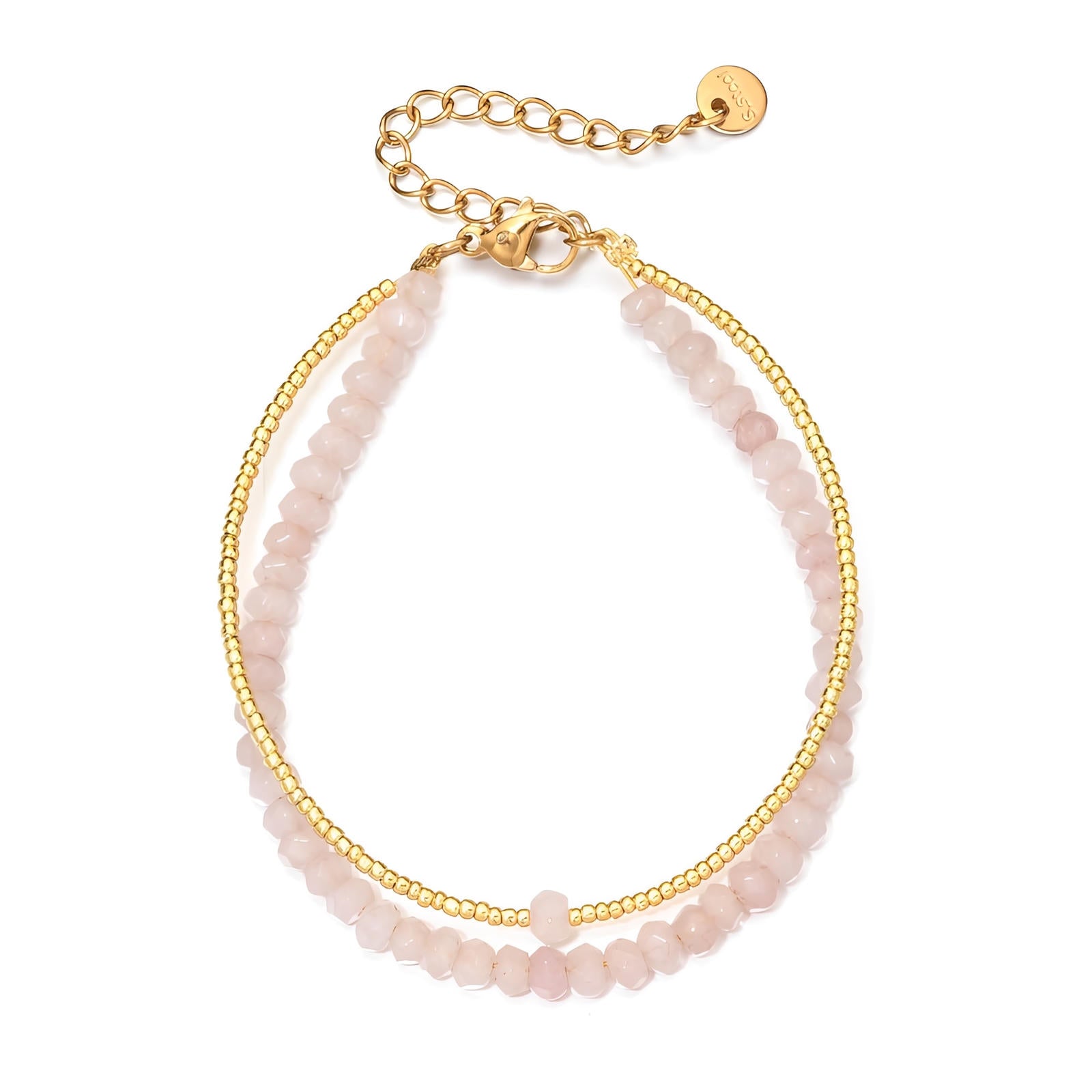 Bracelet double rang avec perles facettées roses poudrées et billes dorées brillantes, fermoir ajustable en métal doré.