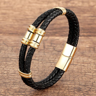 Bracelet homme double-rangs en microfibre noire tressée avec détails métalliques dorés et fermoir magnétique.
