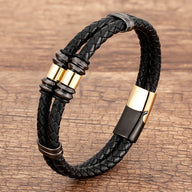 Bracelet homme double-rangs en microfibre noire tressée avec détails métalliques or et fermoir magnétique noir et or.