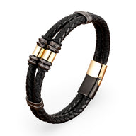 Bracelet homme double-rangs en microfibre tressée noire avec détails métalliques dorés et fermoir magnétique noir et or.