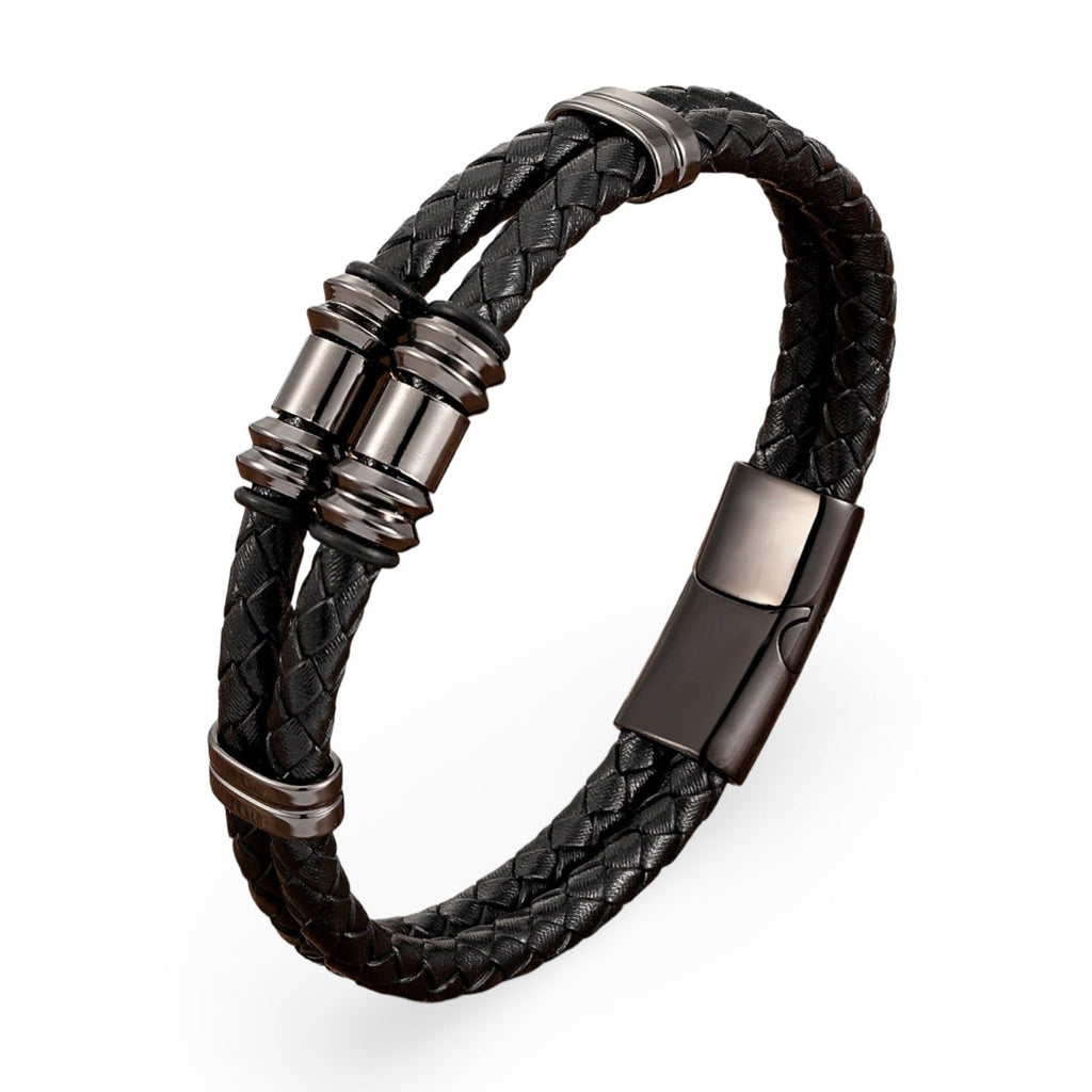 Bracelet double-rangs en microfibre tressée noire avec détails métalliques gris foncé et fermoir aimanté.