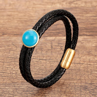 Bracelet double-rangs en microfibre noire tressée avec pierre turquoise ronde et fermoir doré magnétique.