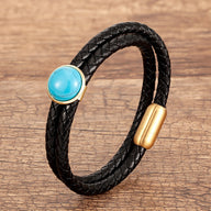 Bracelet double-rangs microfibre noir avec pierre turquoise sertie or et fermoir doré magnétique.