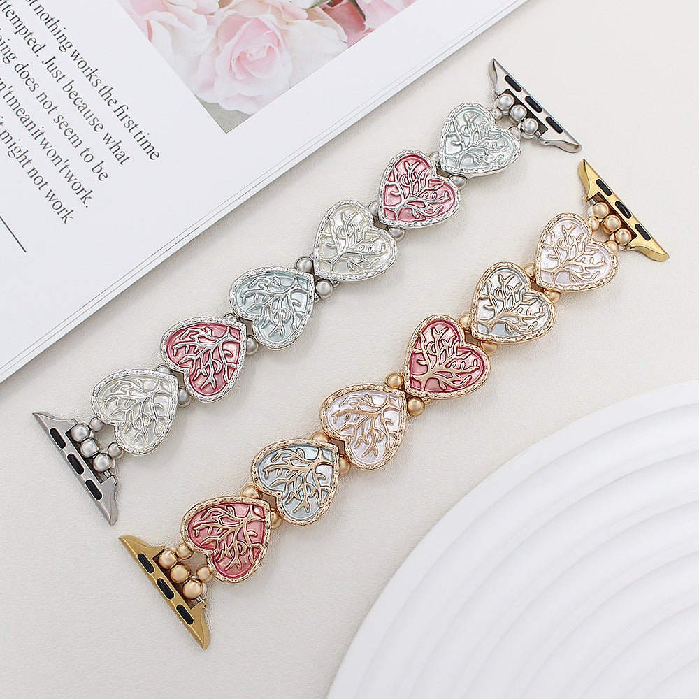 Bracelet Apple Watch elastique, maillons coeur emailles motif arbre de vie, modele Cabra