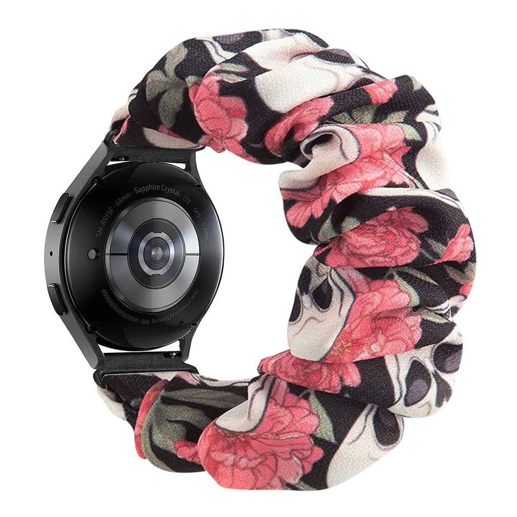 Bracelet élastique chouchou en tissu noir à motifs floraux roses et blancs pour montre connectée, style confortable et large.