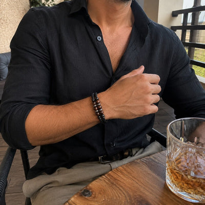 Elegantní náramek, kombinace černé pletené kůže a tygřího oka, odolná ocel s magnetickým zapínáním, model Juanito