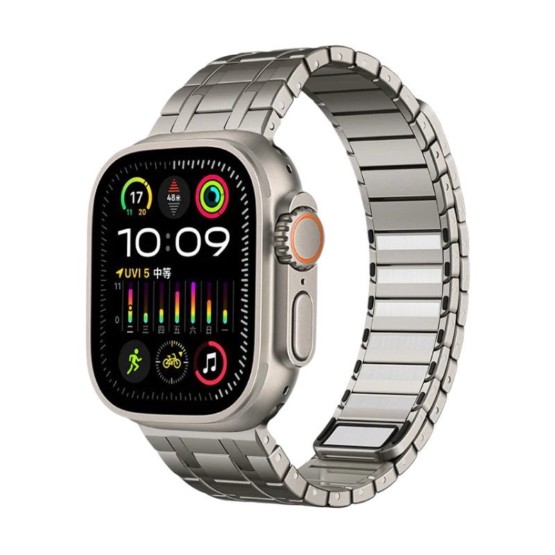 Bracelet ajustable en acier argenté pour Apple Watch, design magnétique et maillons lisses.