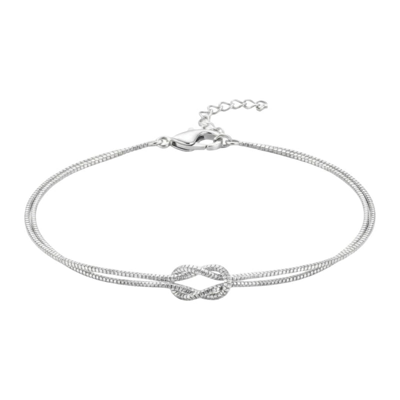 Bracelet fin en acier inoxydable argenté avec nœud central élégant, chaîne double délicate ajustable.