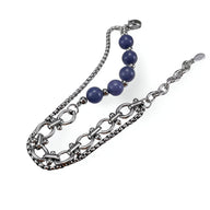 Bracelet homme en acier inoxydable argenté avec perles d'aventurine bleue et double chaîne raffinée.