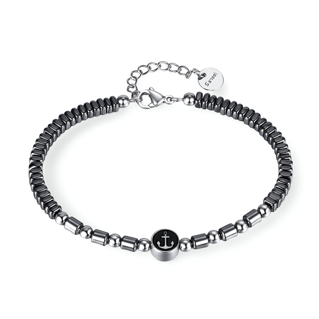 Bracelet homme en acier inoxydable avec perles hématite noires et charm ancre argenté ajustable.