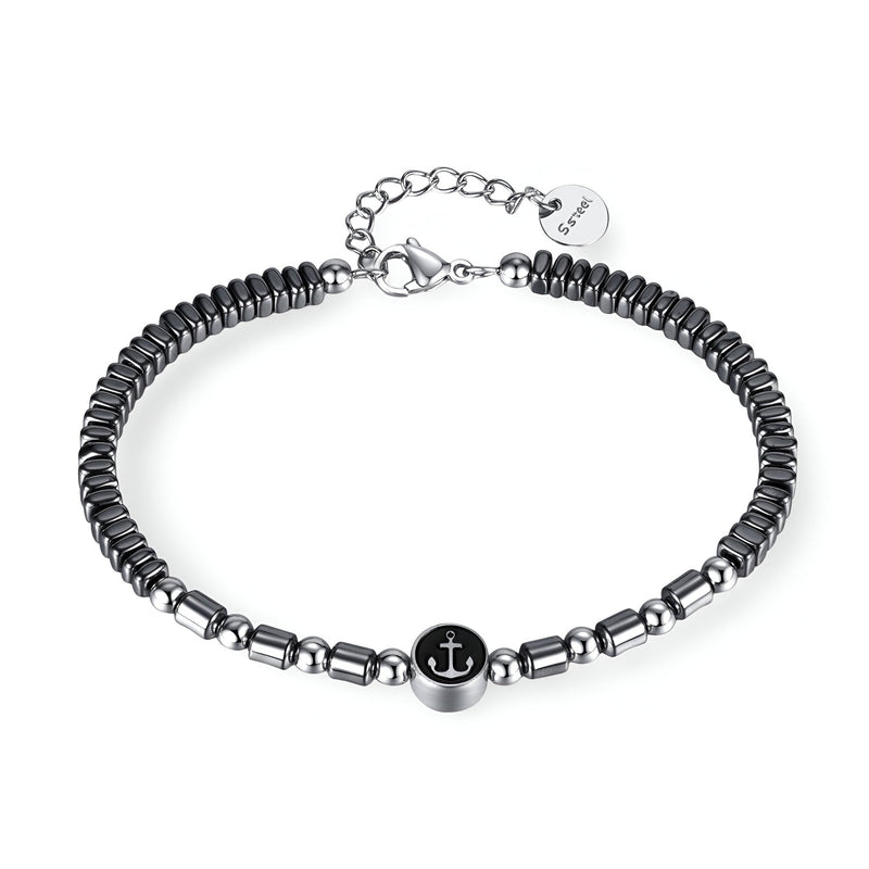Bracelet homme en acier inoxydable avec perles hématite noires et charm ancre argenté ajustable.