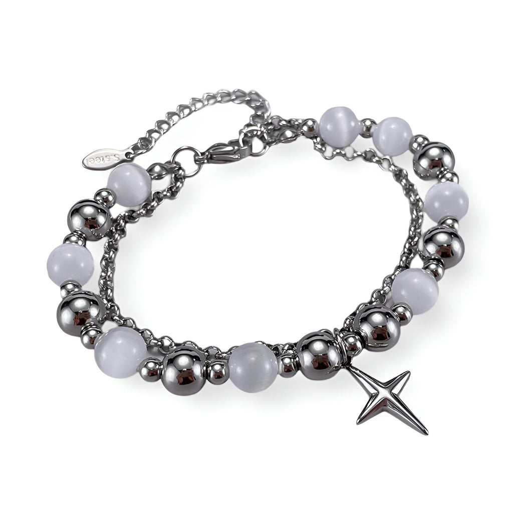 Bracelet homme en acier inoxydable argenté avec perles œil de chat blanches et pendentif étoile.