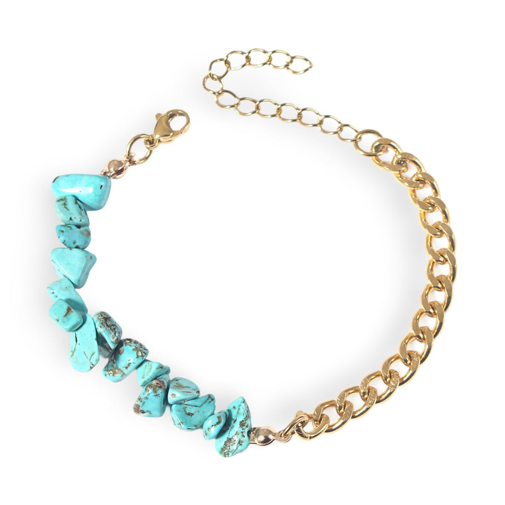 Bracelet pour femme avec pierres turquoise naturelles et chaîne en acier doré ajustable.