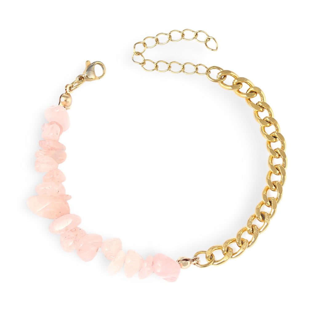Bracelet doré avec chaîne et pierres naturelles rose quartz aux formes irrégulières.