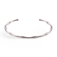 Bracelet en acier inoxydable argenté design bambou ouvert style minimaliste féminin.
