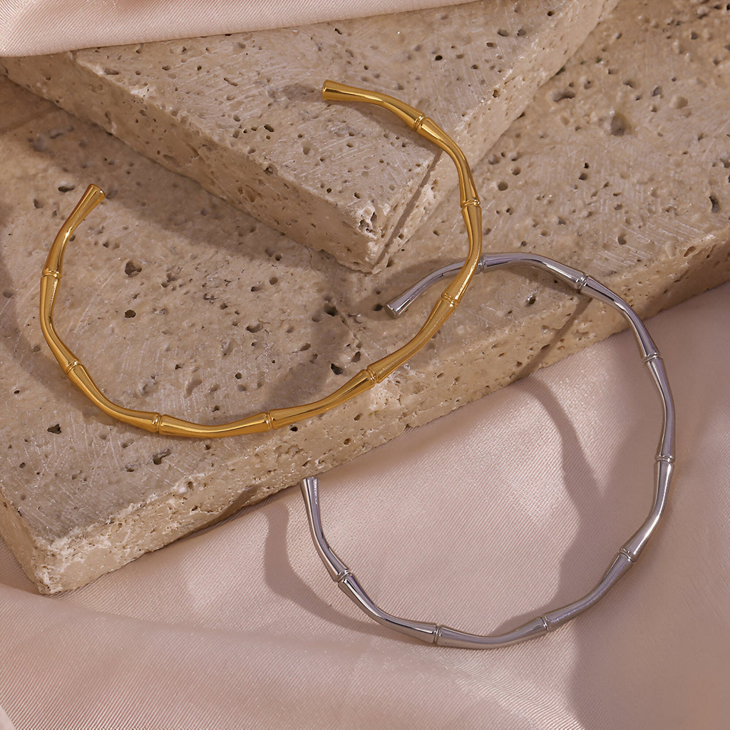 Bracelet bambou en acier inoxydable, plaqué or 18 carats, modèle Anji doré et argenté.