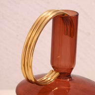 Bracelet rigide or 18 carats trilogie d'anneaux fins et lisses au design épuré.