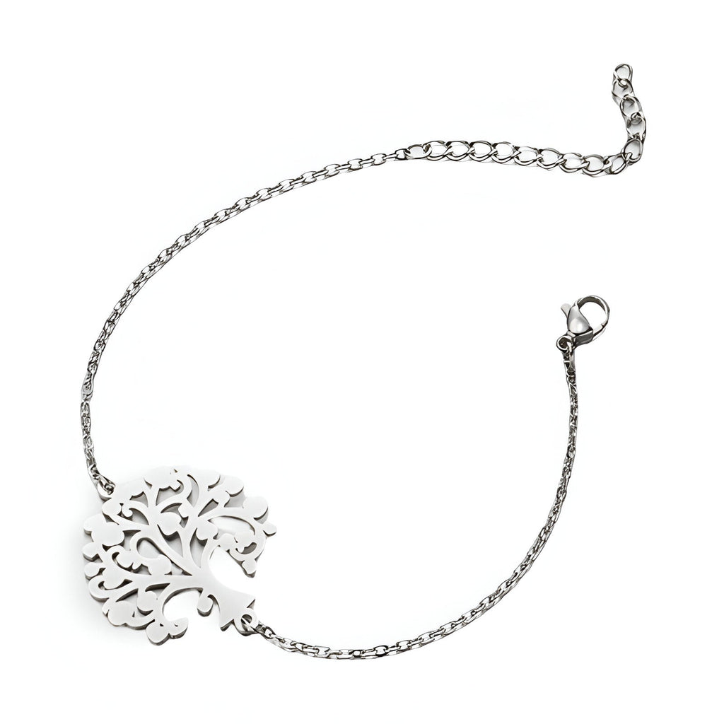 Bracelet fin en acier inoxydable argenté avec pendentif arbre de vie ajouré et chaîne délicate.