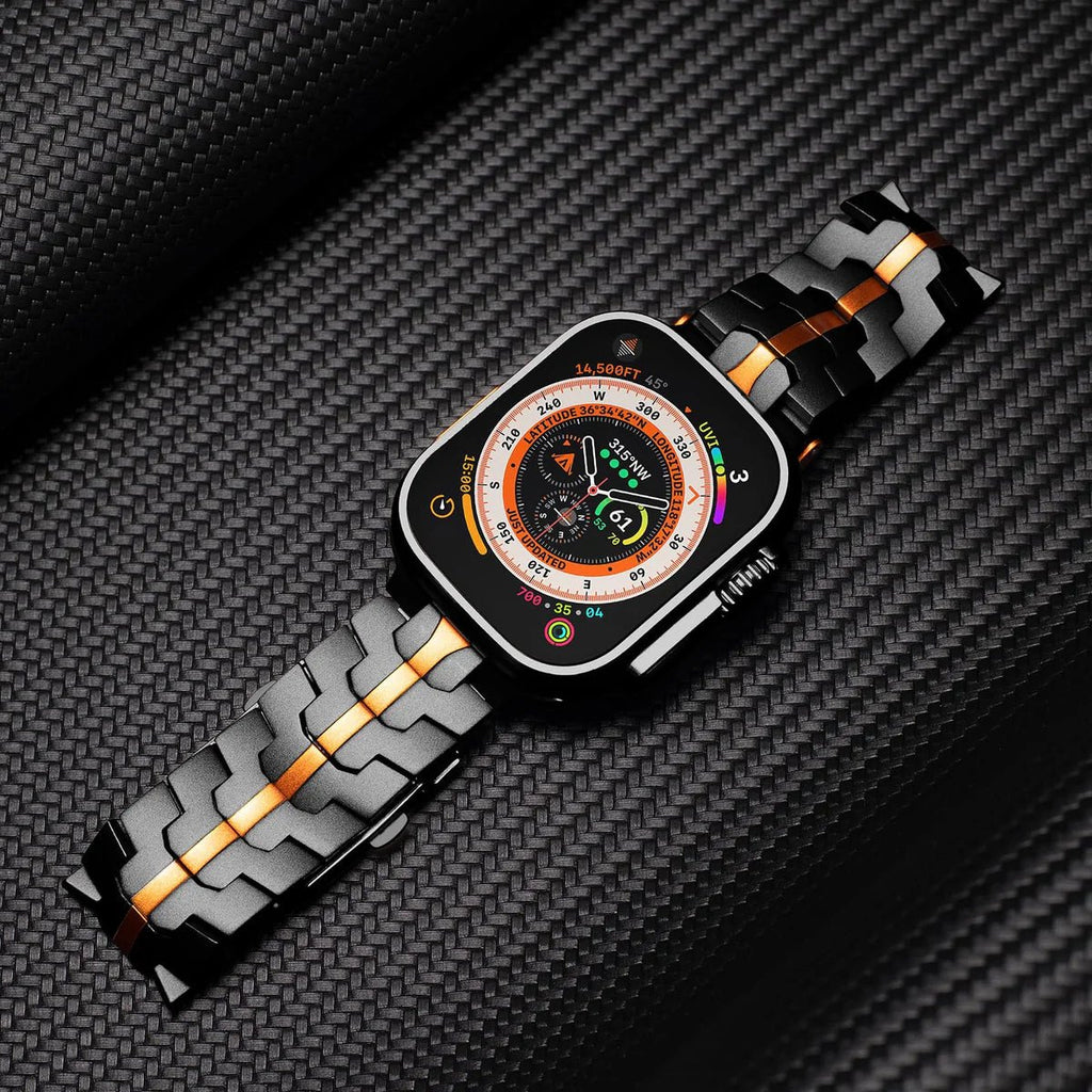 Bracelet ajustable en acier inoxydable noir et orange avec montre Apple Watch affichant cadran numérique circulaire.
