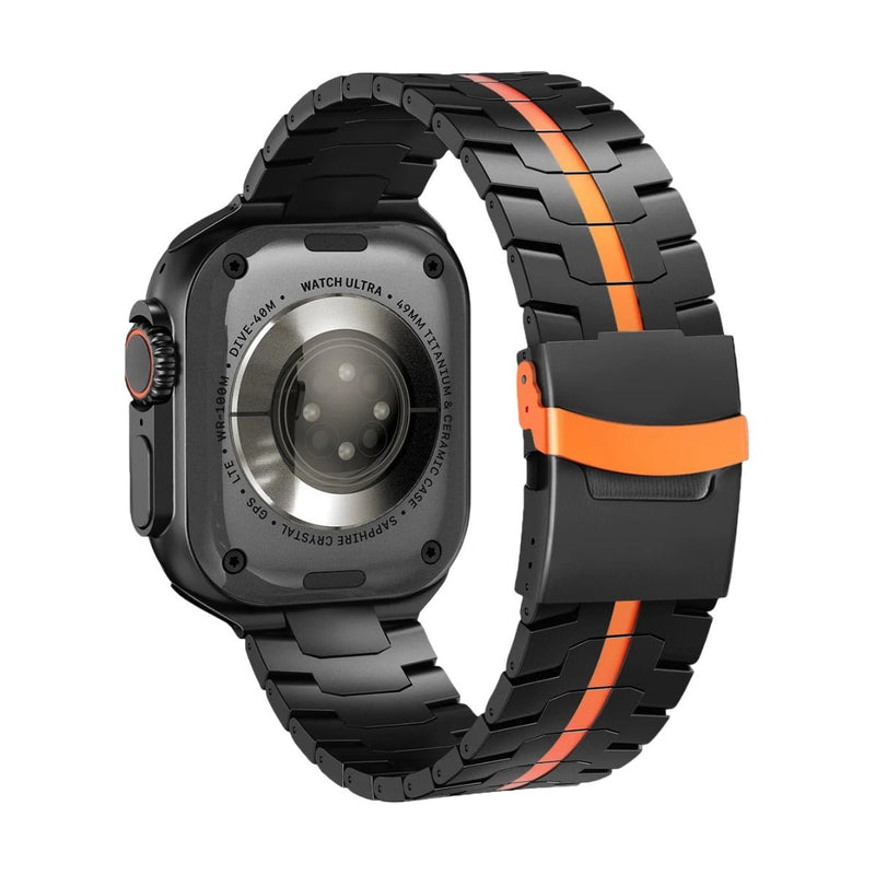 Bracelet en acier inoxydable noir avec bande orange centrale pour Apple Watch, fermoir ajustable.