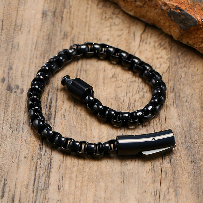 Bracelet homme en acier inoxydable noir, maille rolo épaisse, fermoir magnétique design, waterproof.