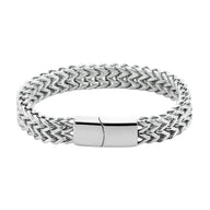 Bracelet homme en acier inoxydable argenté, maille spiga, fermoir magnétique lisse, style moderne.
