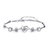 Bracelet en argent avec charms en forme de cœur et cristaux étincelants, modèle Stacy.