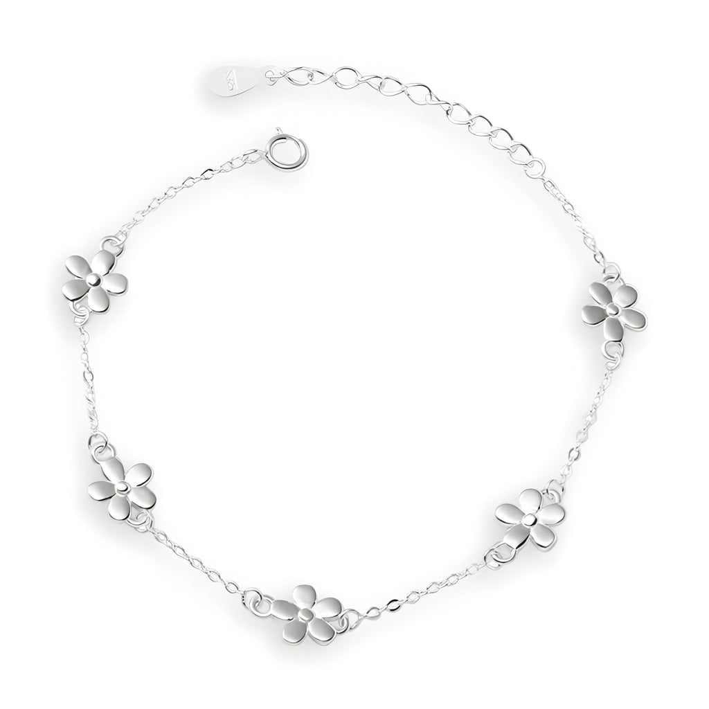 Bracelet argent sterling chaîne fine avec cinq ornements floraux polis espacés élégamment.