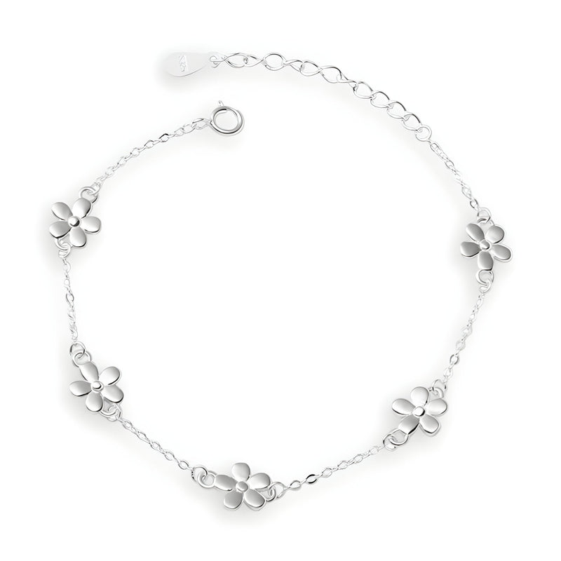 Bracelet argent sterling chaîne fine avec cinq ornements floraux polis espacés élégamment.