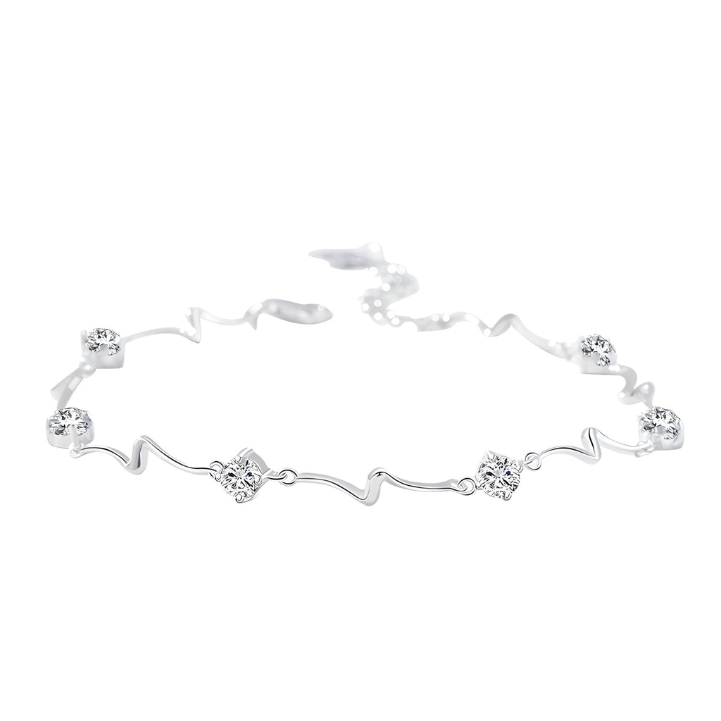 Bracelet en argent sterling avec motifs ondulés et fleurs délicates, style océanique.