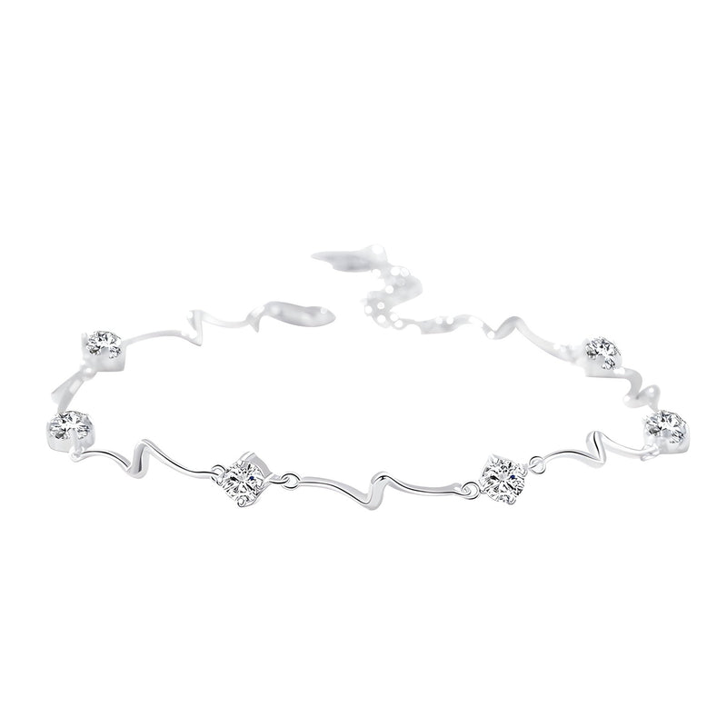 Bracelet en argent sterling avec motifs ondulés et fleurs délicates, style océanique.