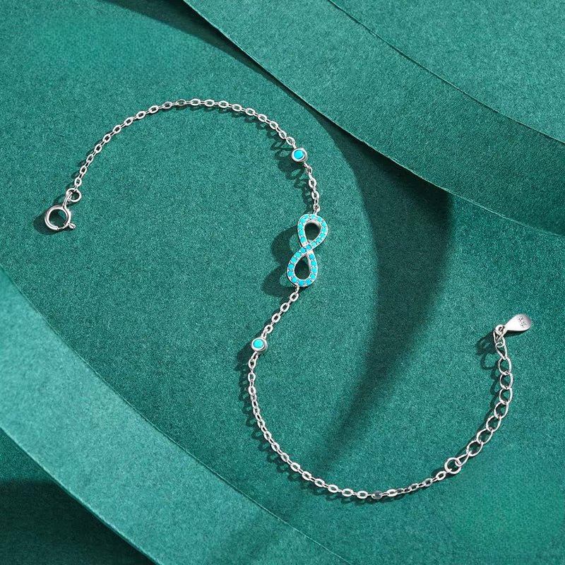 Bracelet fin en argent sterling avec charm infini orné de petites turquoises, modèle Béatrice.