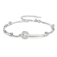 Bracelet en argent sterling pour femme avec design barrette et anneau orné de cristaux.