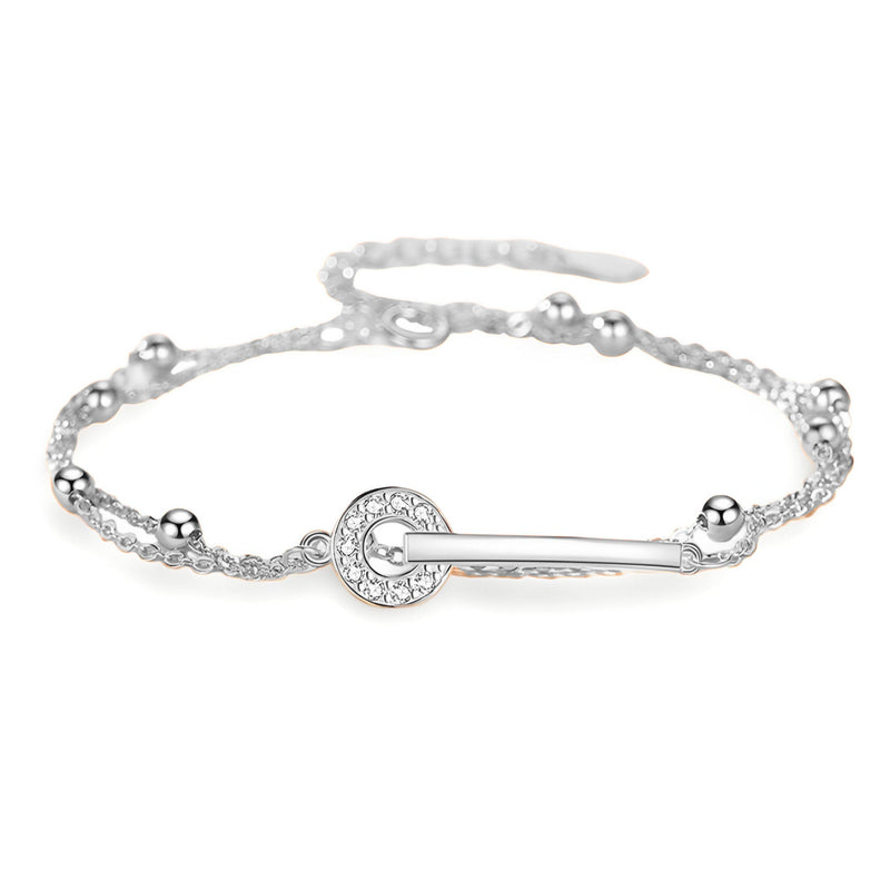 Bracelet en argent sterling pour femme avec design barrette et anneau orné de cristaux.