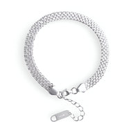 Bracelet tressé en argent sterling pour femme avec fermoir à mousqueton et chaîne de réglage.