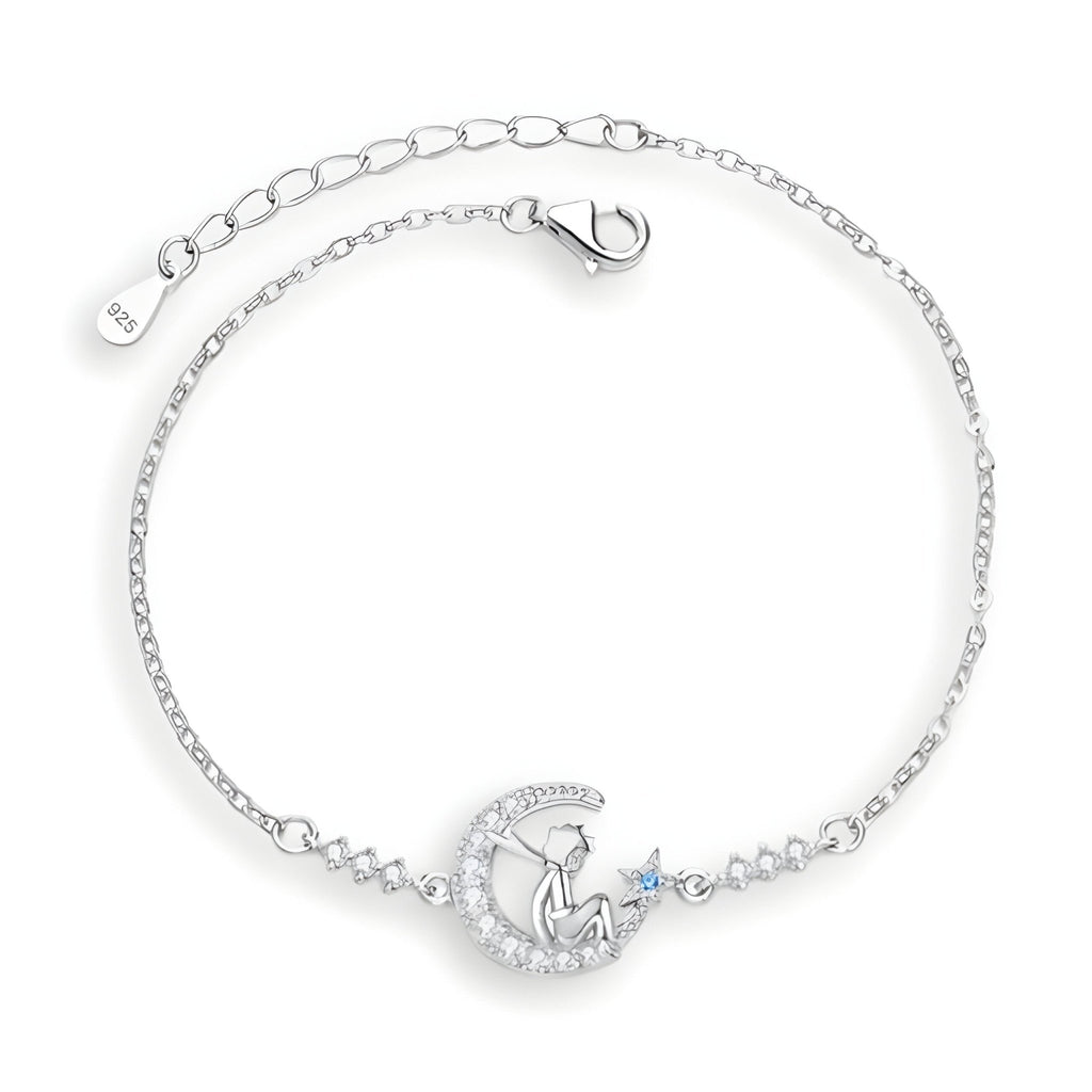 Bracelet en argent sterling avec pendentif lune et Petit Prince, détail étoile bleue, chaîne fine.