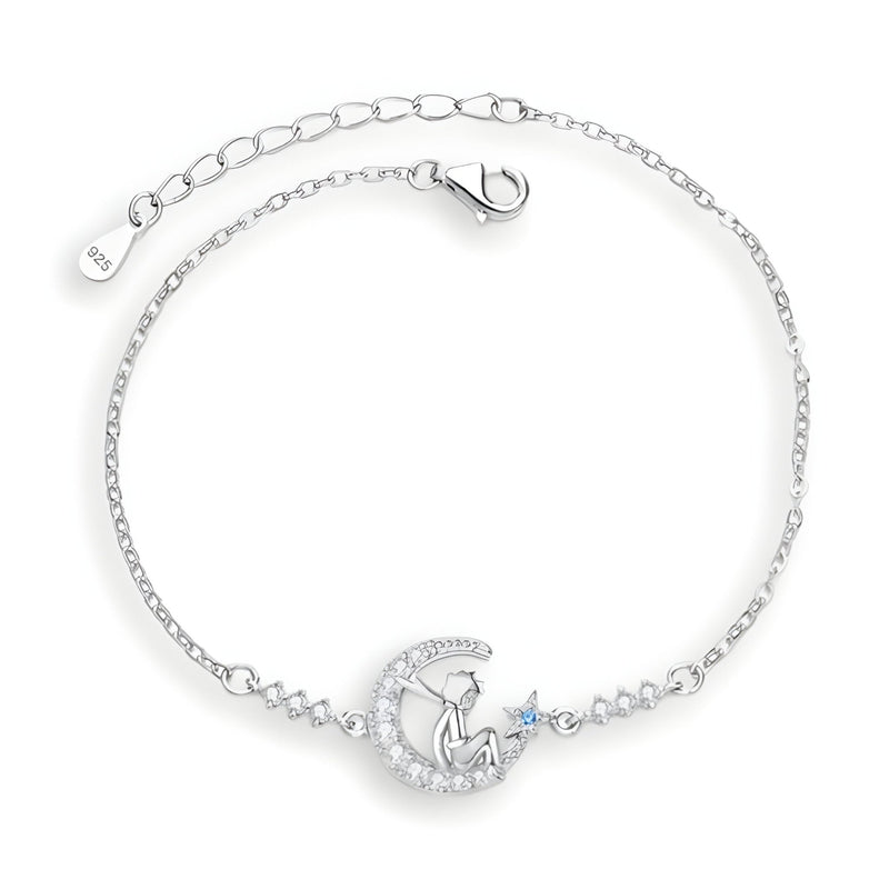 Bracelet en argent sterling avec pendentif lune et Petit Prince, détail étoile bleue, chaîne fine.