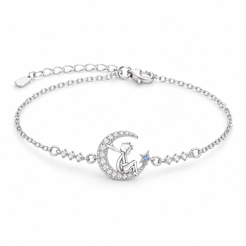 Bracelet Isabeau argent Petit Prince et étoile bleue, posé de face sur fond blanc