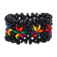 Bracelet en bois noir avec perles colorées rouge, jaune, vert, violet et orange, motif fleuri.