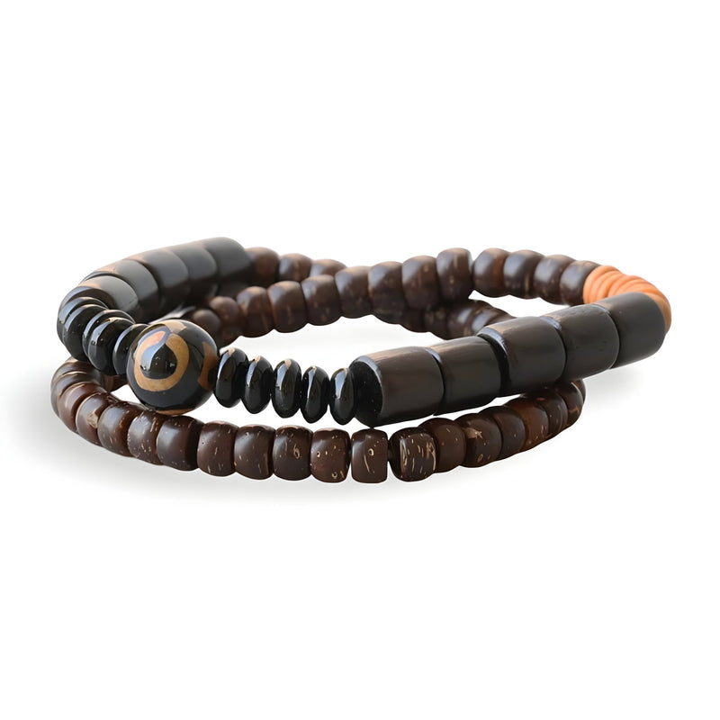 Bracelet mixte en bois d'ébène noir et perles d'obsidienne lisse avec un œil de tigre décoratif.