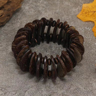 Bracelet femme en coquilles de noix de coco café, style rétro, forme élastique et ronde.