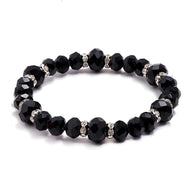 Bracelet femme perles facettées noires et intercalaires strass éclatants modèle Ange.
