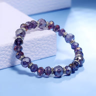 Bracelet femme en cristal violet aux perles facettées et effet brillant, style élégant.