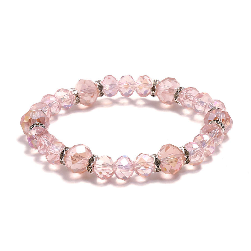 Bracelet femme en cristal rose clair avec perles facettées et anneaux argentés élégants.
