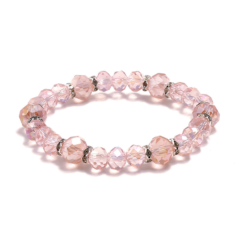 Bracelet femme en cristal rose clair avec perles facettées et anneaux argentés élégants.