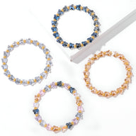 Lot de bracelets en cristal aux formes de papillons couleurs gris, bleu, multicolore et rose.